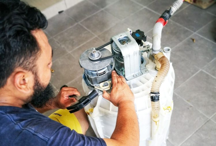 repairing washing machine drum